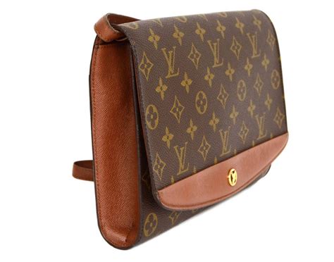 lv clutch vintage|louis vuitton women's clutch.